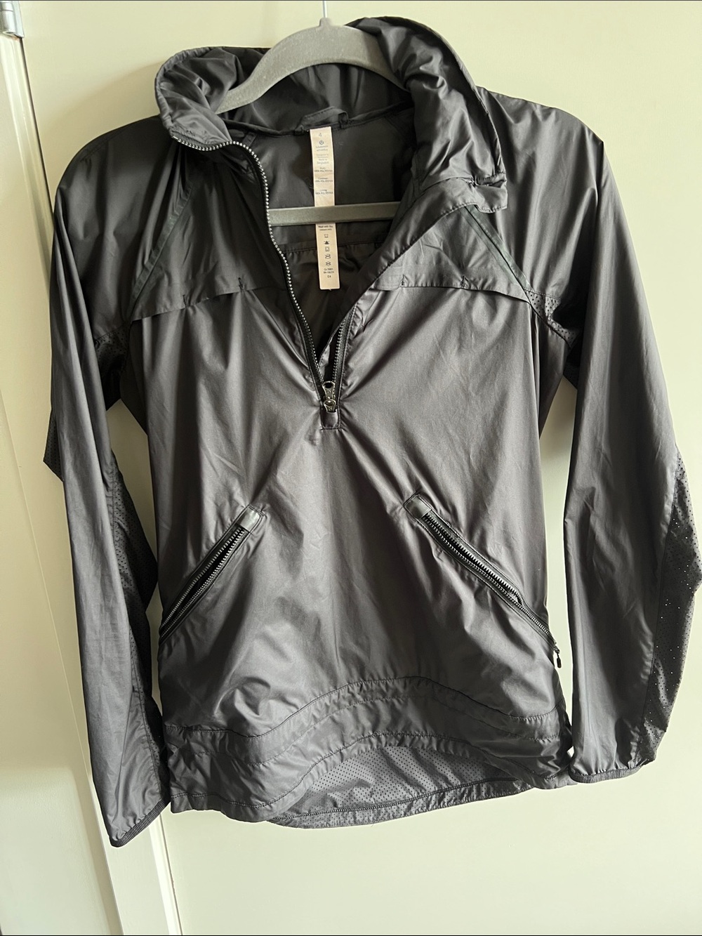 Rare. WMNS. Lululemon athletica Black Hooded Jacket with Center Tag Detail.